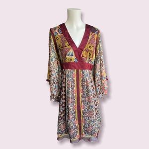 Single vintage flowy multicolored dress with cutout back